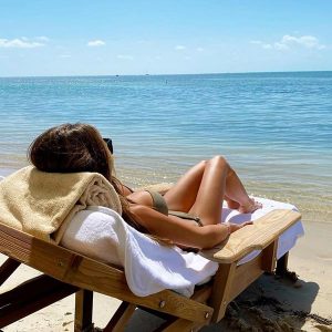 woman reclining on beach
